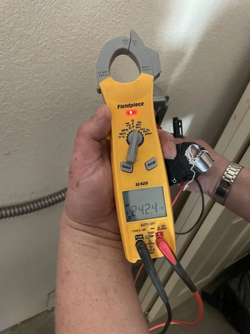 Voltage testing with clamp meter during Generator Installation in Odessa